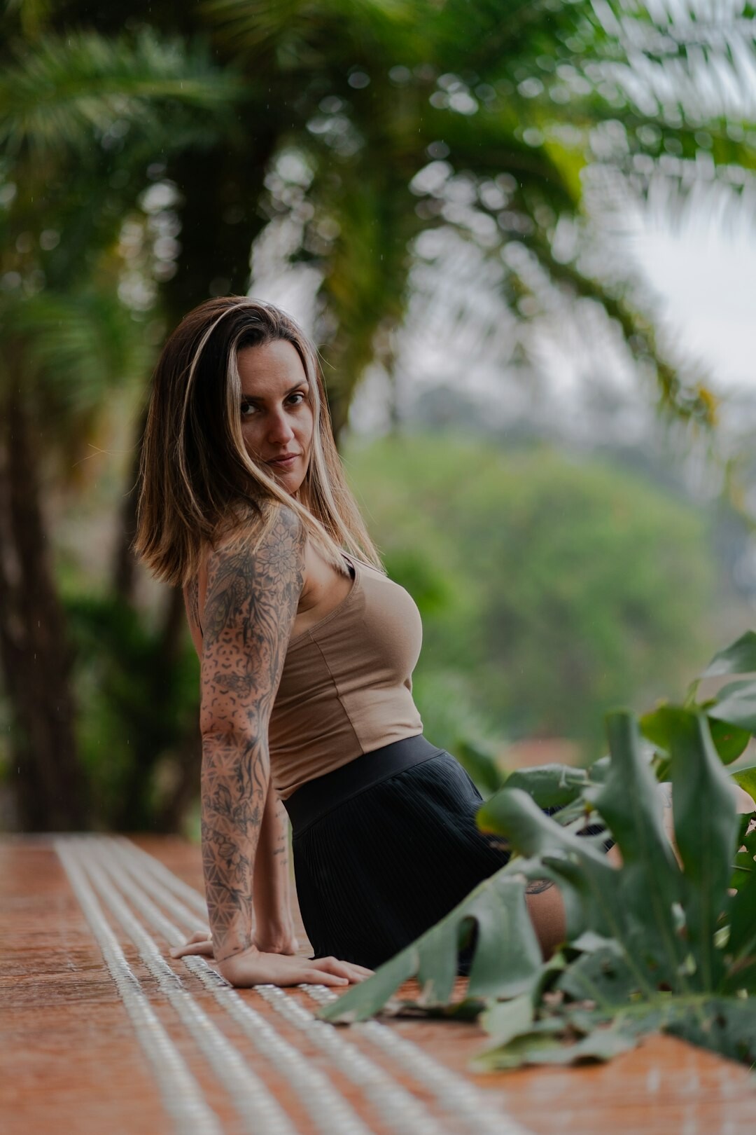Indian Singaporean female yoga and mindfulness coach smiling