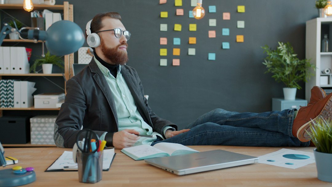 person stretching at desk