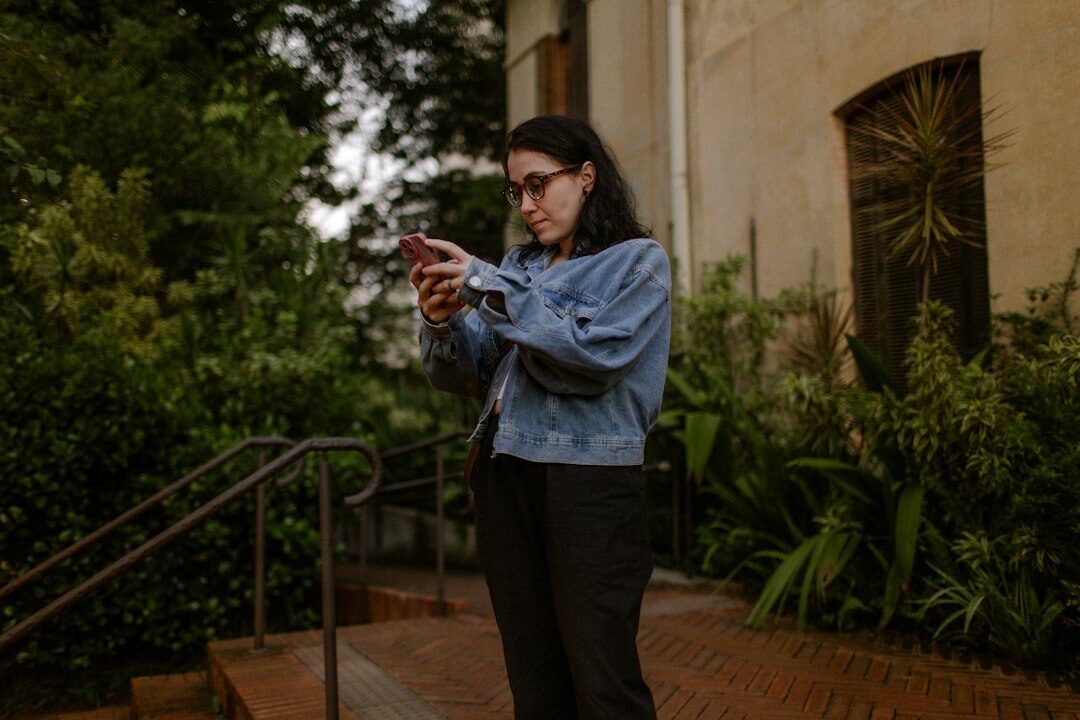person reviewing notes outdoors