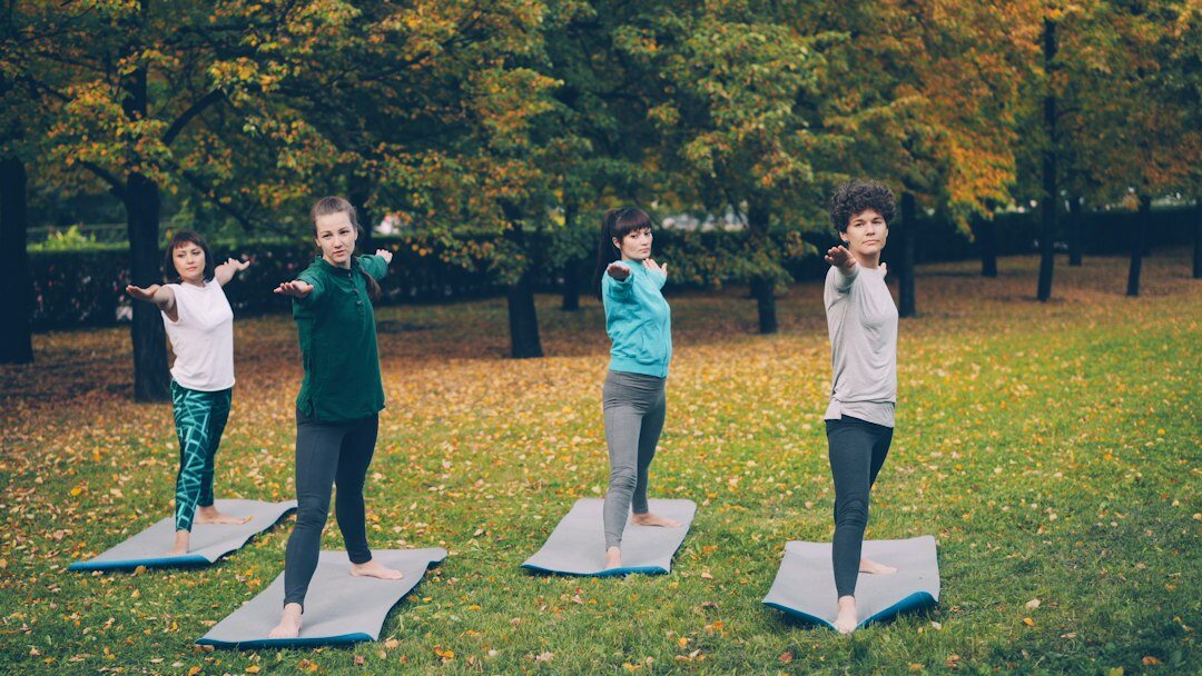 woman practicing yoga outdoors