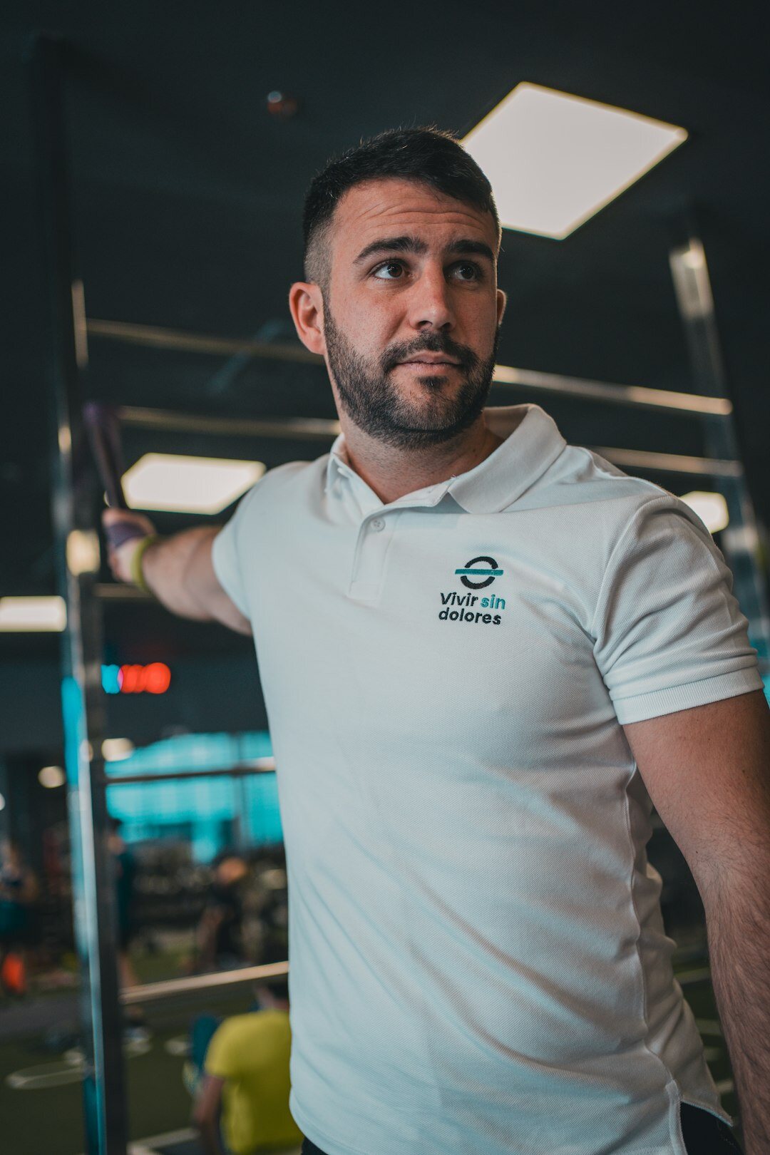 Malay Singaporean male mobility coach in casual athletic wear